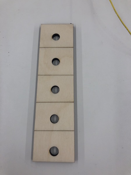 Wood fretboard
